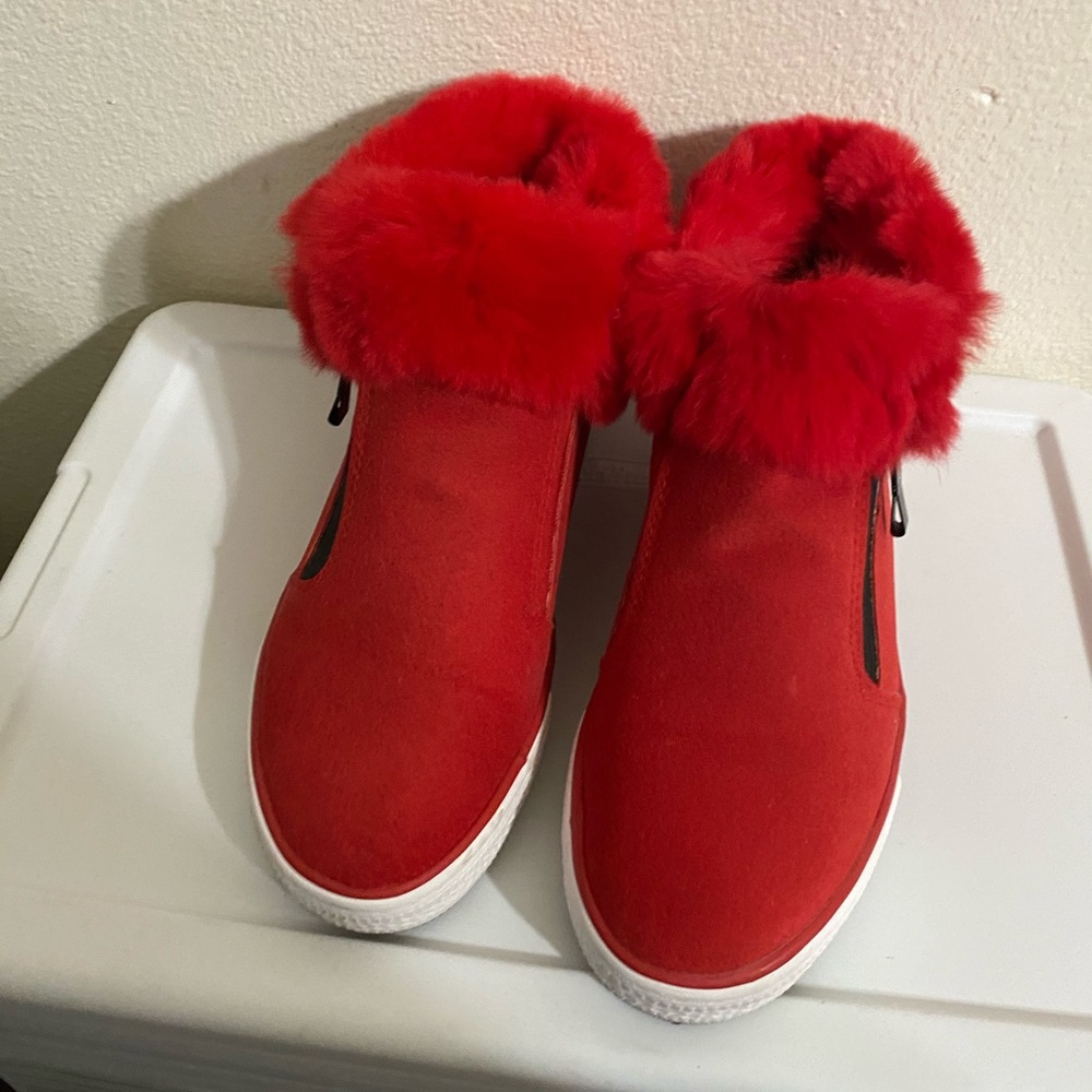 Red suede and faux fur shoes.
